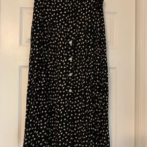 Elastic waist XL skirt in lightweight fabric.  About 36” long with buttons